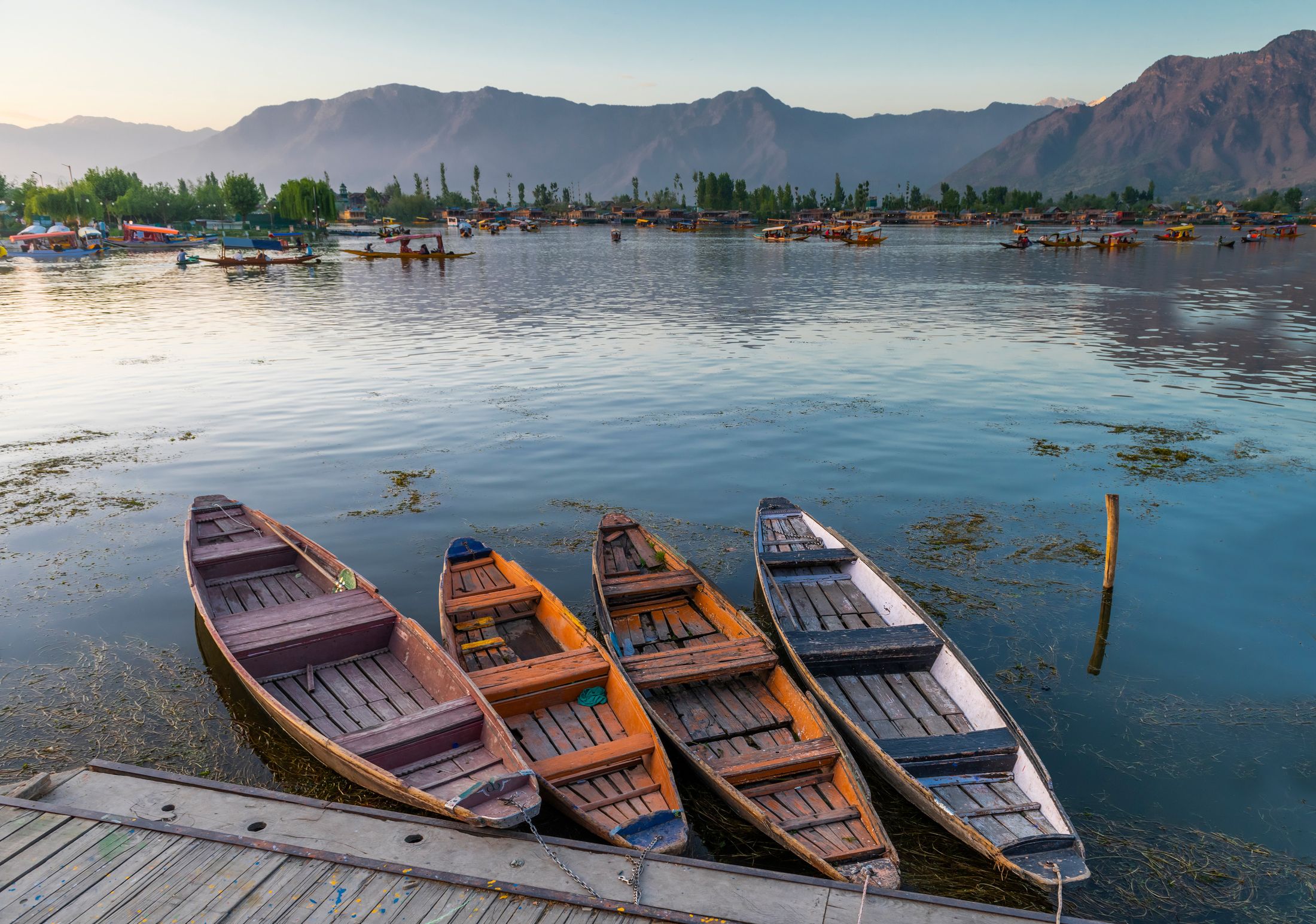 Wooden boats on a mountain lake